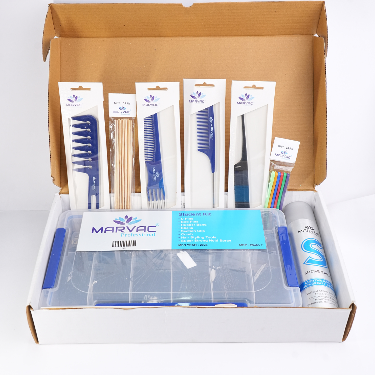 Open Marvac student hair styling kit box showing combs, section clips, pins, styling spray and storage case