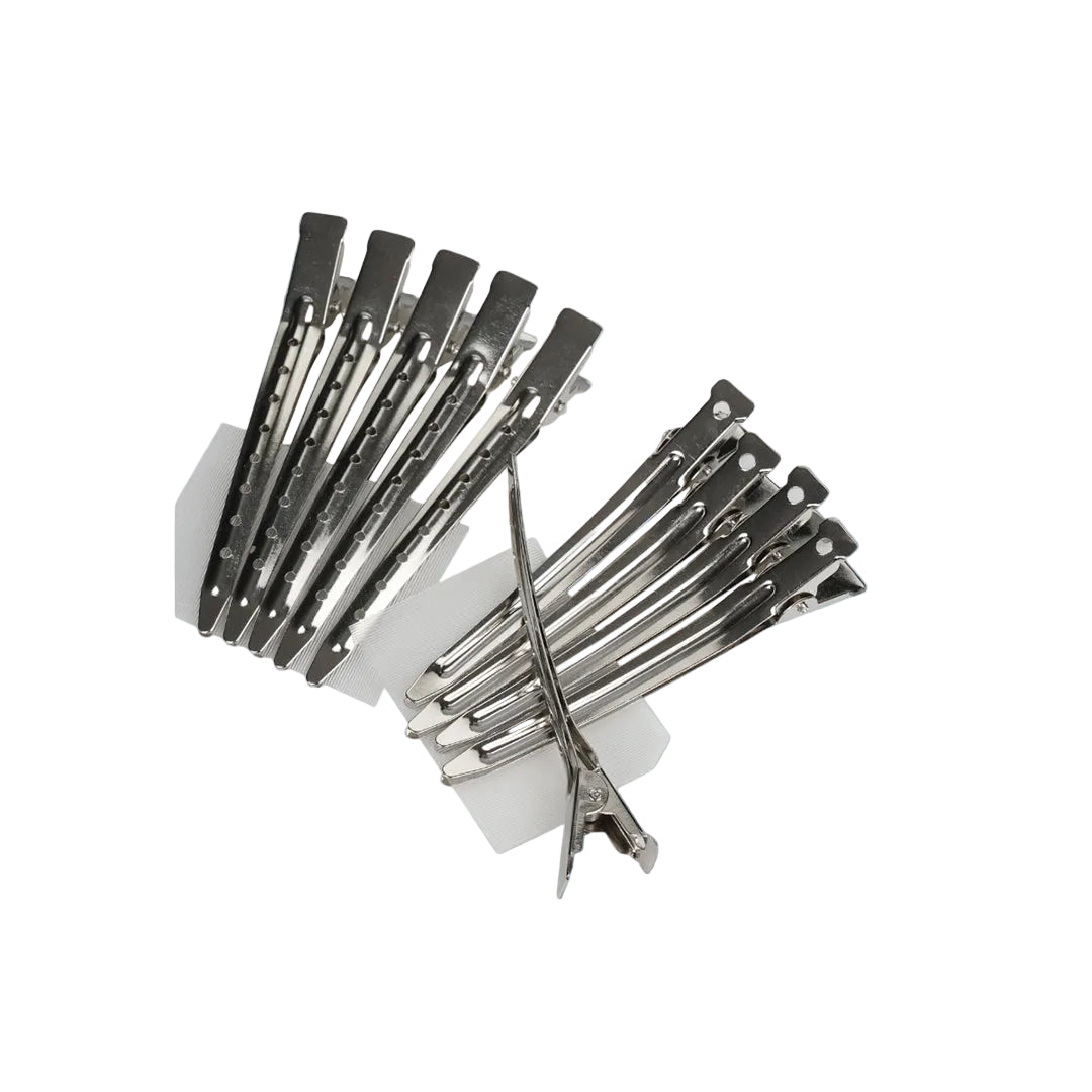 Large silver metal hair clips designed for thick hair in salon use